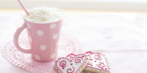 pink mug and heart shaped cookies for Valentine's Day