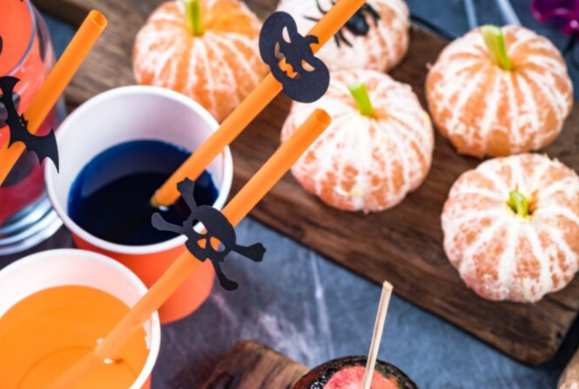 pealed oranges as snacks to look like pumpkins halloween cups and straws healthy Halloween Treats
