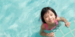 young girl in pool
