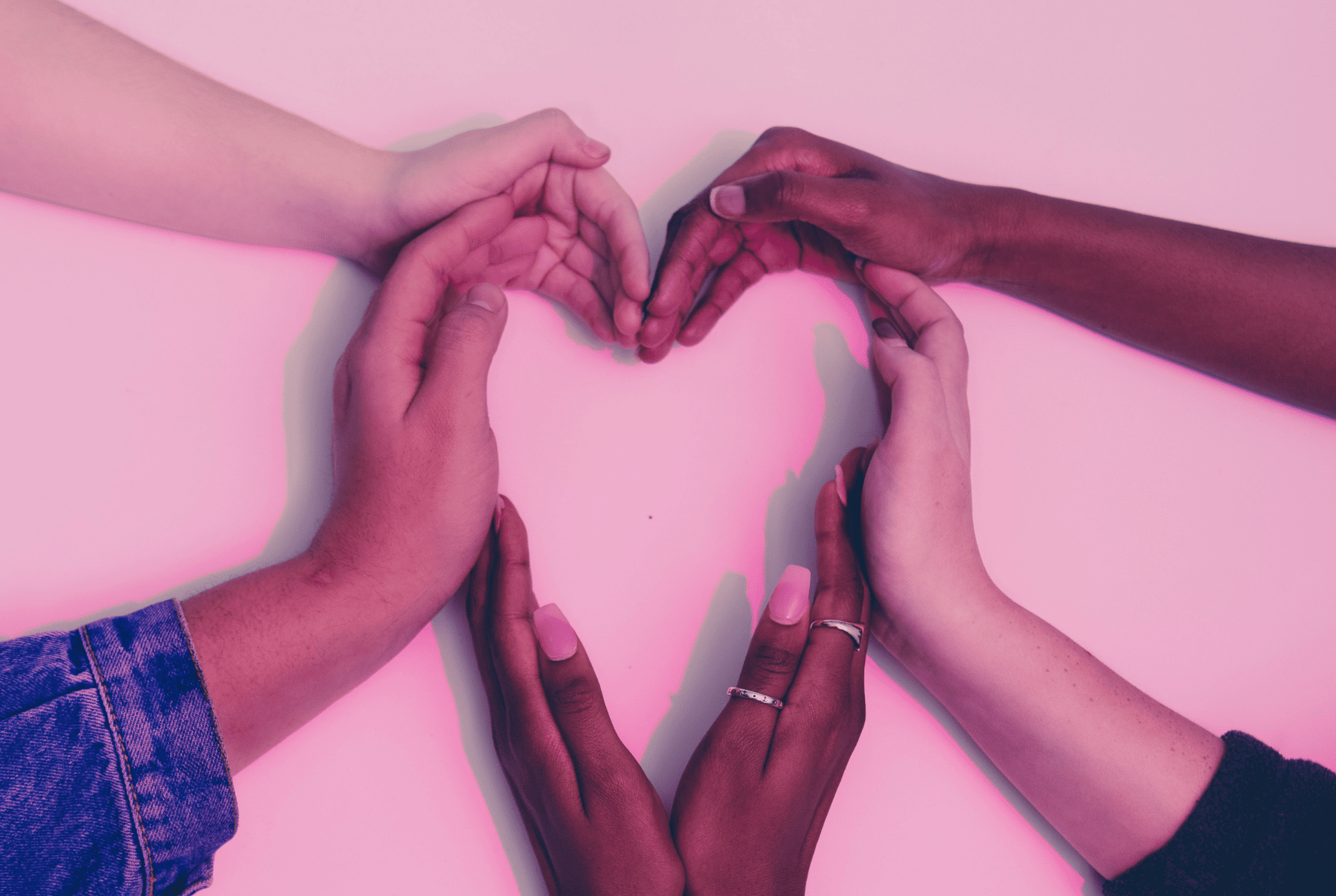 childrens hands forming to make a heart